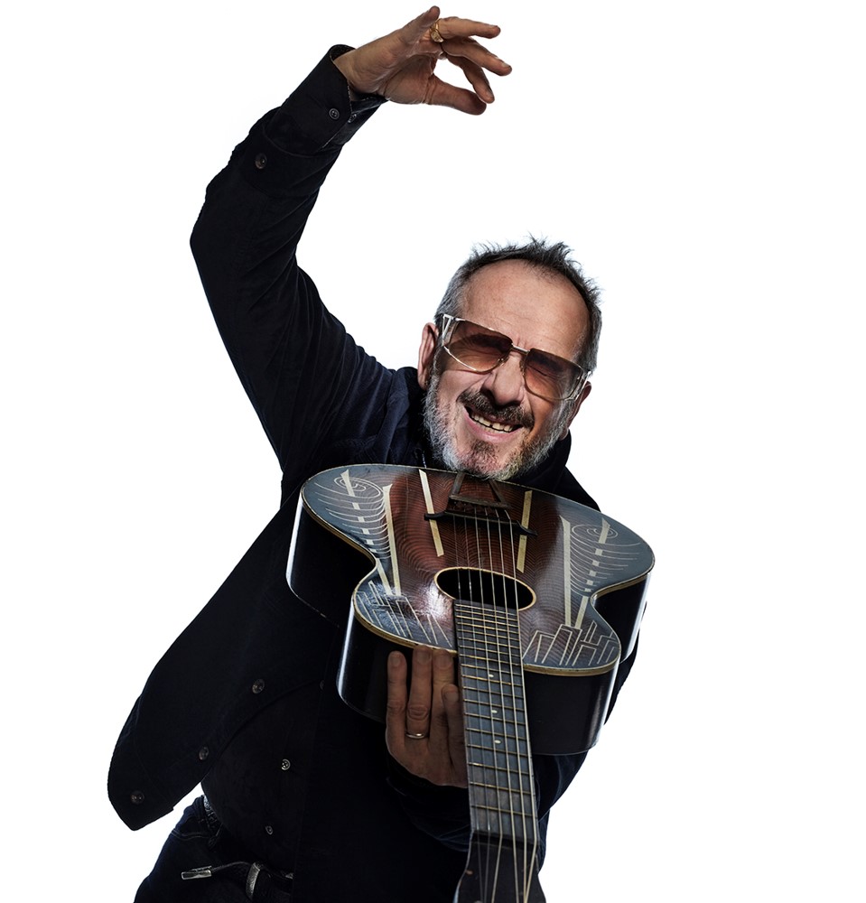 Elvis Costello & The Imposters drop new song ‘Paint the Red Rose Blue