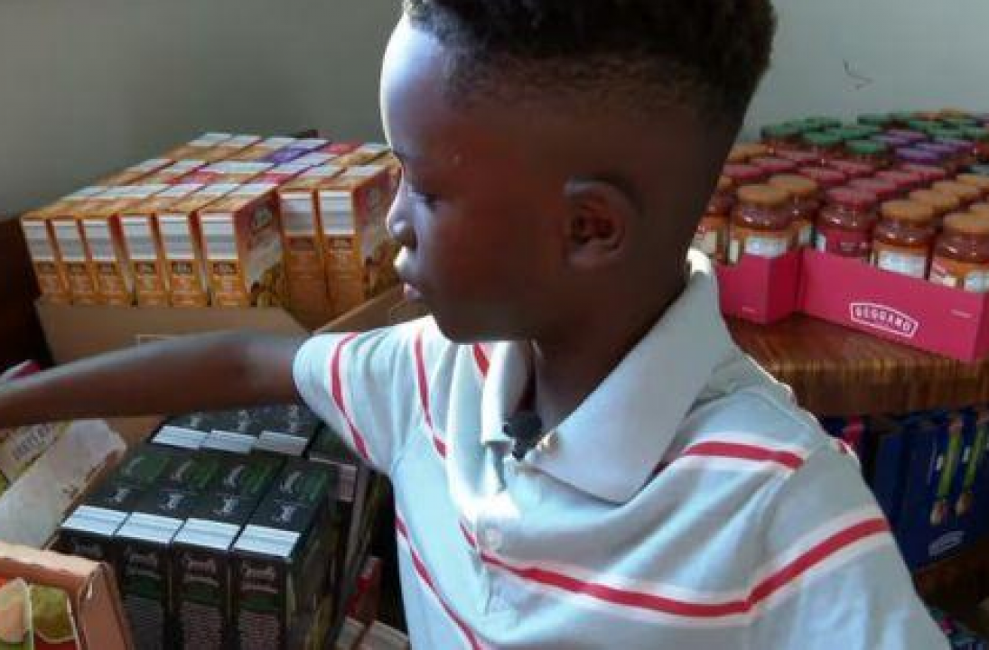 Eight-year-old organizes food drive for families who have lost their benefits